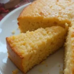 Golden, crispy Southern cornbread served in a cast-iron skillet, featuring a moist interior and a savory, buttery flavor. Perfect as a side dish or a snack